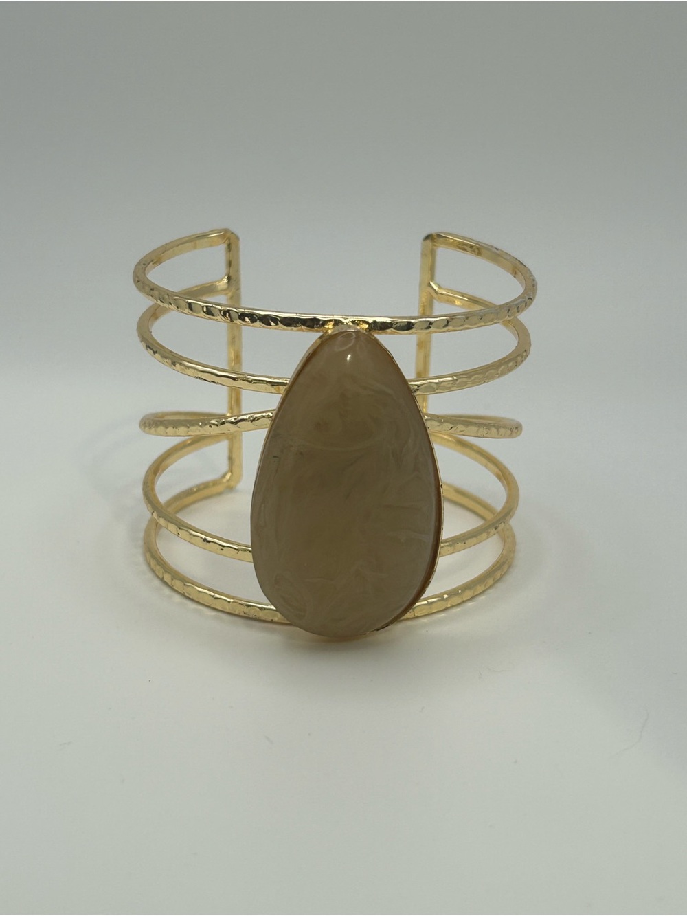 Gold Cuff Bracelet with Beige Teardrop Stone